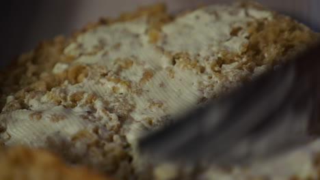 close view of sliced homemade bread smear with butter