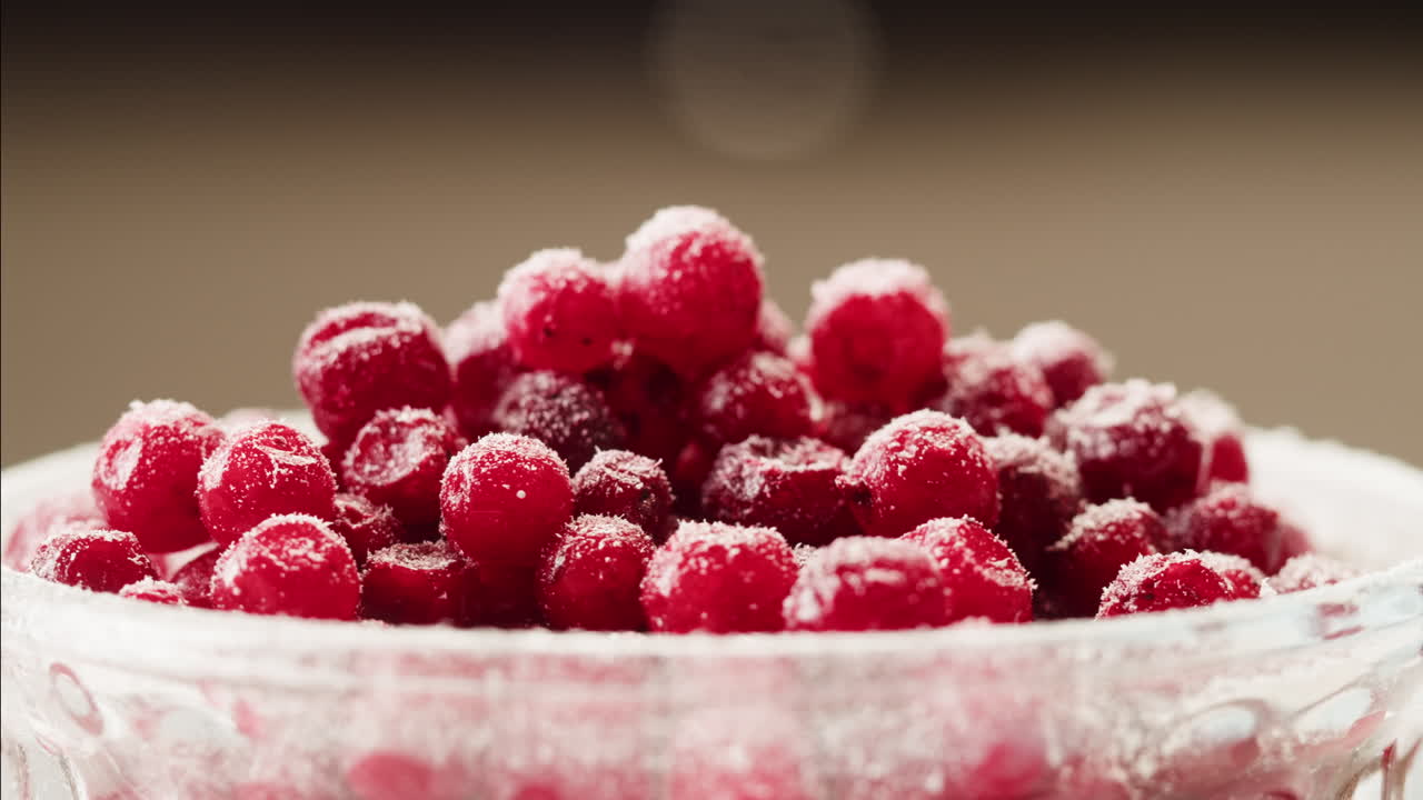 Frozen cranberries cooking for tea or jam, Background Close up of cranberry berries in on the kitchen, chef making dessert healthy pie.