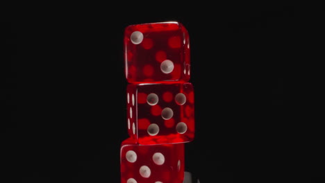 Stack-of-small-transparent-red-cubes-with-white-spots