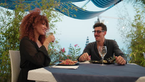 smile and joy during the romantic lovely dinner at the beach resort