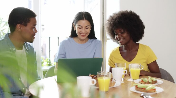 Three people having breakfast