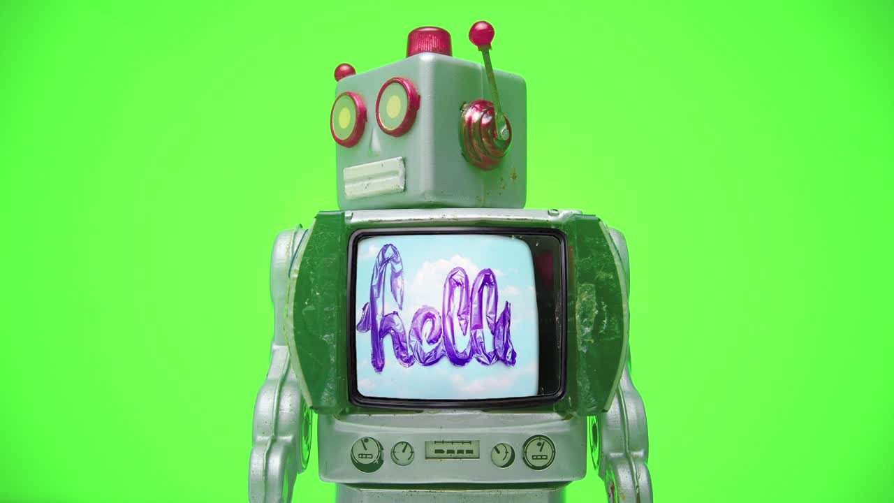 un robot retro camina y dice hola y luego camina