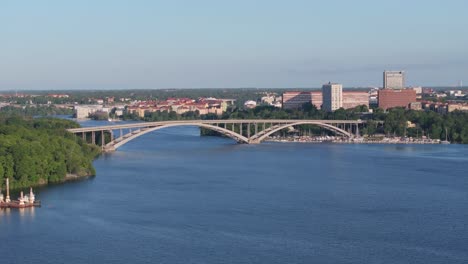 aerial view of traffic on west bridge, connection across the river in stockholm city, sweden