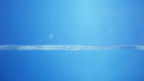 water drop splash on blue background