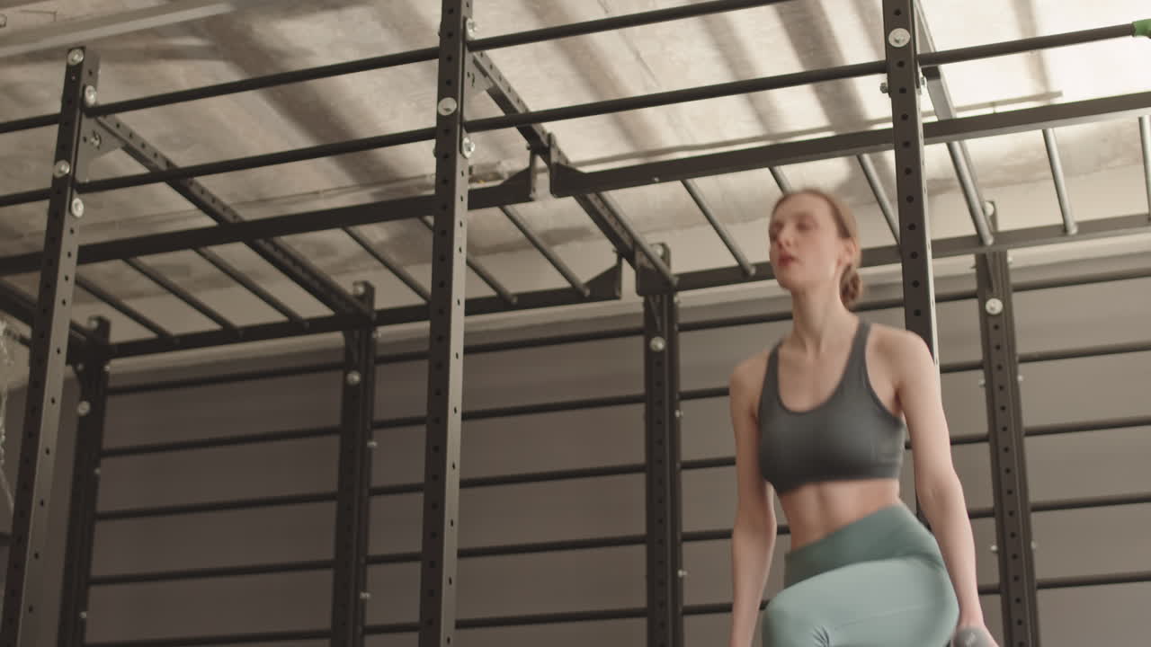 Caucasian Woman Exercising with Dumbbells