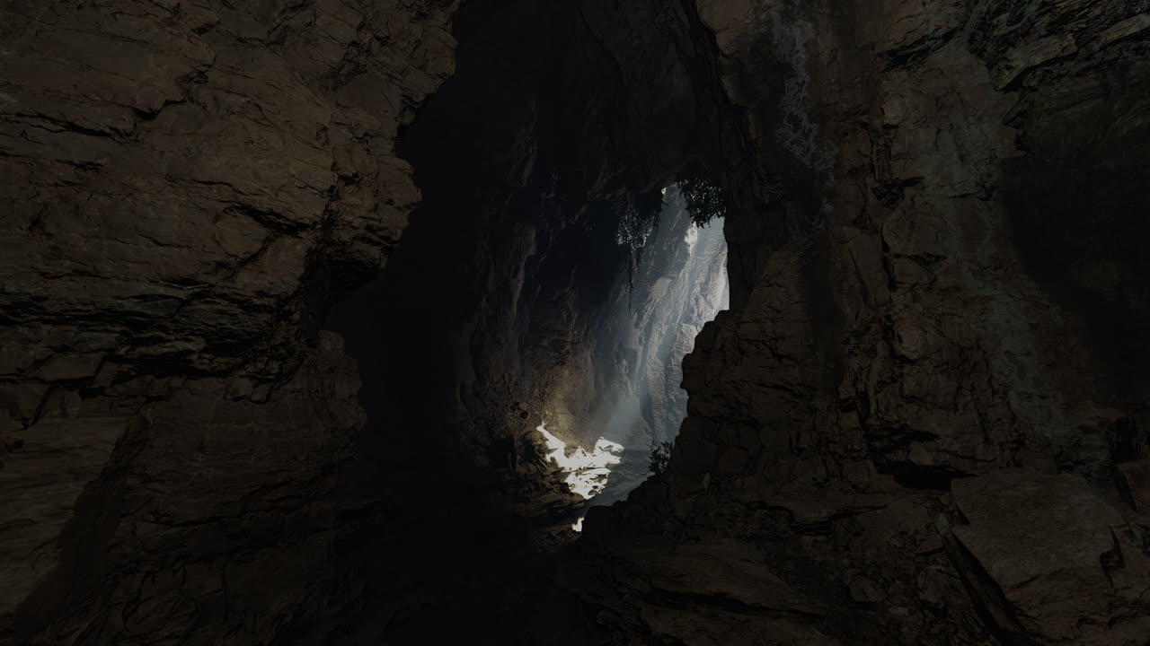 Light filtering through a cave entrance reveals hidden beauty inside