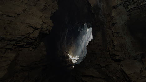 light filtering through a cave entrance reveals hidden beauty inside