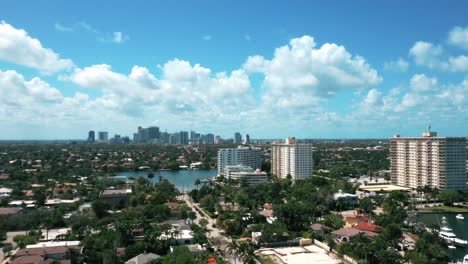 high-rise apartment buildings and town around the sunset lake in fort lauderdale, florida, usa