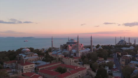 Beautiful-Sunset-Over-Hagia-Sophia-In-Fatih-District-Of-Istanbul,-Turkey---aerial-drone