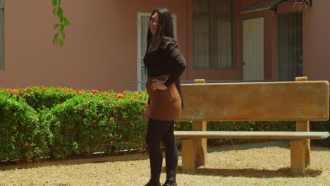 young latina in a park with a mini skirt