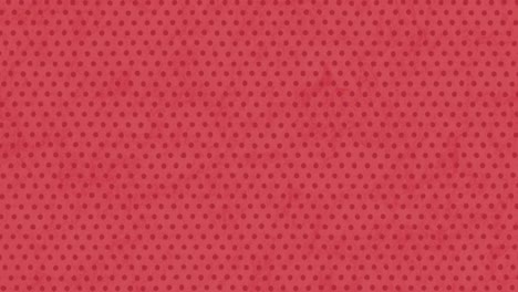 rows of dots moving against red background