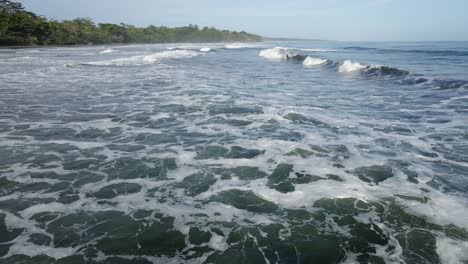 ocean tide rising with swell