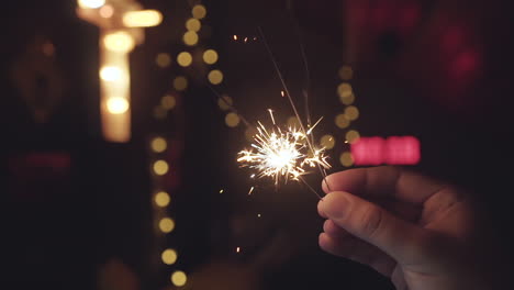 Bright-sparklers-burning-down-in-slow-motion