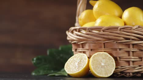 fresh lemons in the basket with the leaves slowly rotate.