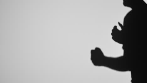 expressive hand gestures in silhouette