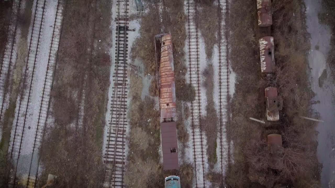 Aerial View of Abandoned Railway with Rusty Train Cars