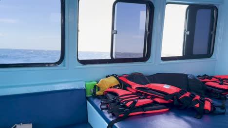 boat cabin interior with life vests