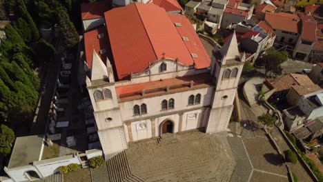 Bird&#039;s eye view of Santa Maria della Neve church, Cuglieri, aerial establishing
