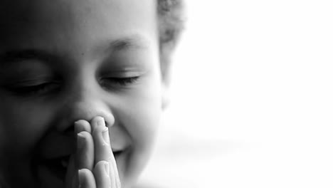 boy praying to god with hands held together with people sock footage stock video