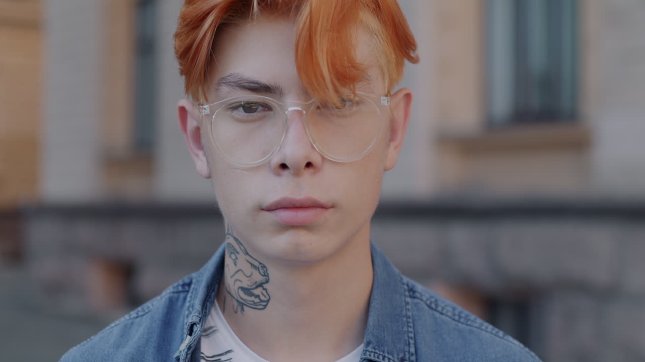Teenage Boy with Red Hair and Glasses