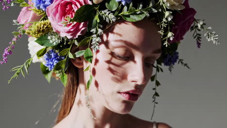 woman with floral crown and dappled light