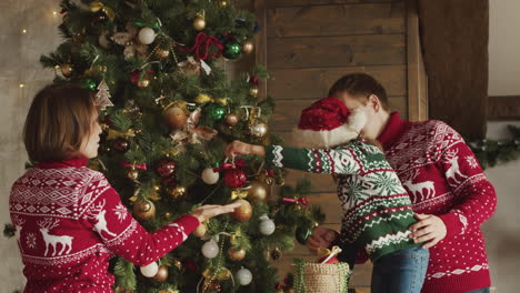 happy family decorating christmas tree at home 1