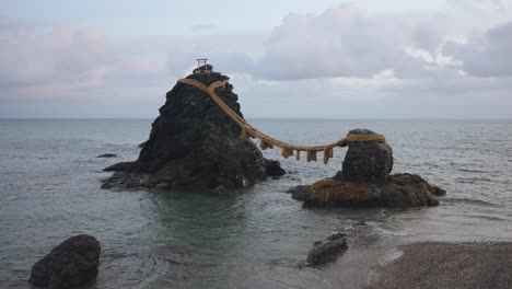 meoto iwa wedded rocks in mie, low tide on seaside of japan