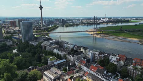 dusseldorf city skyline over the rhine and oberkasseler bridge