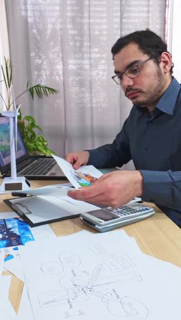 Engineer Clearing His Desk to Focus on a New Task