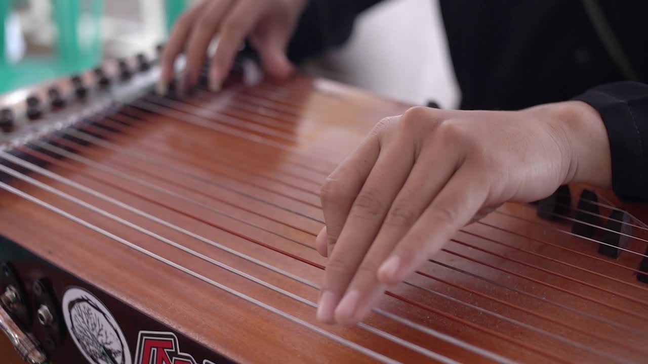 Kecapi - a traditional musical instrument from Indonesia, usually played by plucking like a guitar. This harp musical instrument is almost the same as the harp