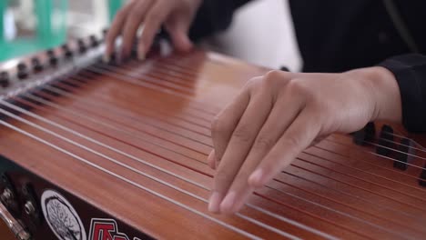 kecapi - a traditional musical instrument from indonesia, usually played by plucking like a guitar. this harp musical instrument is almost the same as the harp