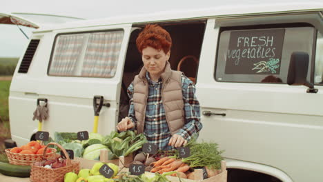 Portrait-of-Positive-Female-Farmer-Selling-Fresh-Vegetables