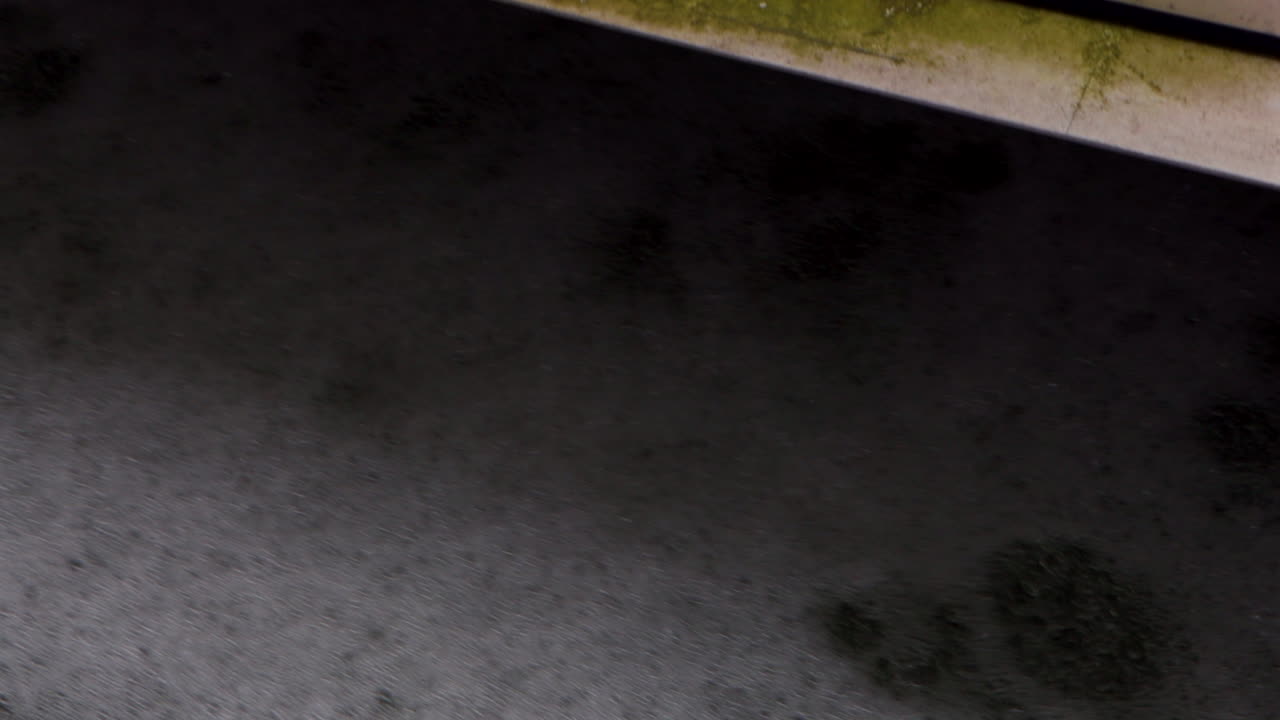 UV-treated effluent water bubbles and flows through channels, creating rippling patterns and a dynamic, industrial processing scene