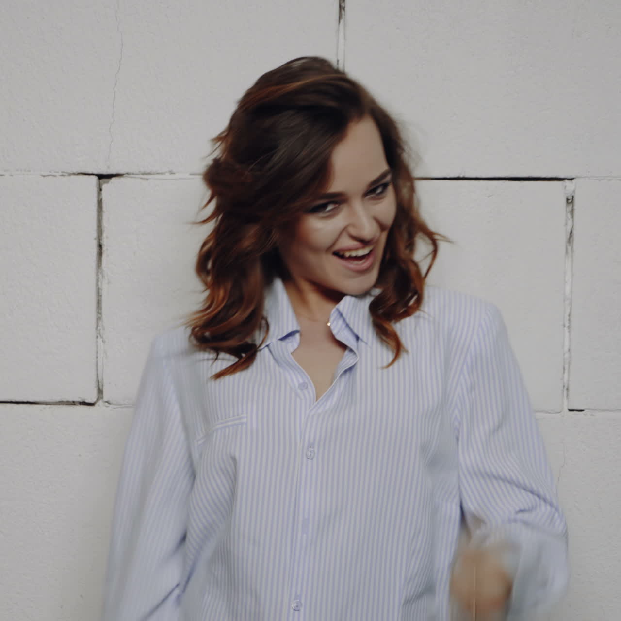 Woman in a striped shirt, happy portrait