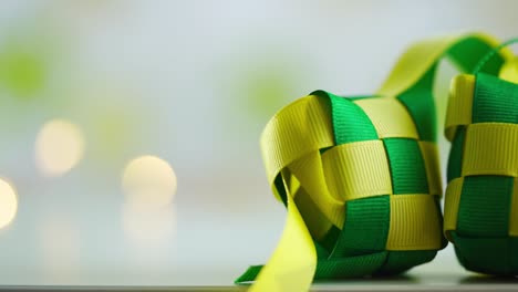 selective focus of ribbon ketupat against defocused light