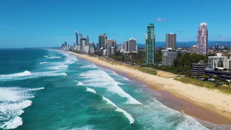 revealing drone shot of the gold coast, a metropolitan region south of brisbane on australia’s east coast