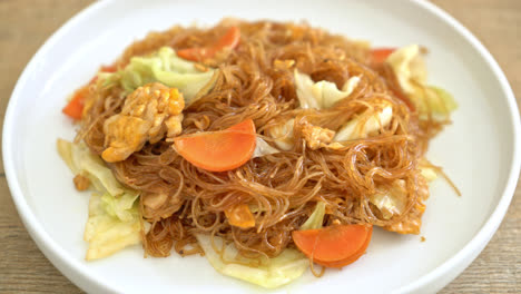 stir fried vermicelli with cabbage, carrot and egg - vegan food style