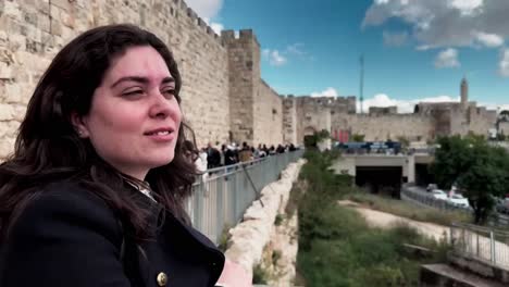 smiling woman enjoying jerusalem city view