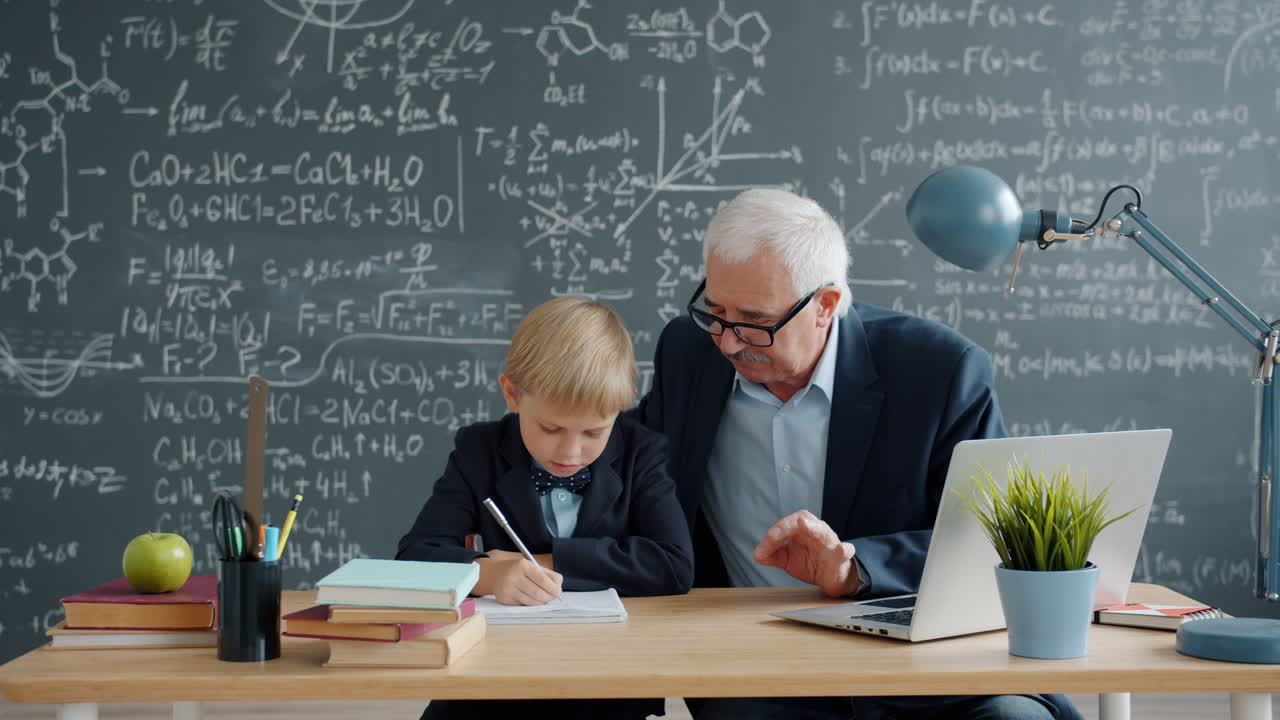 Teacher tutoring a student in a classroom