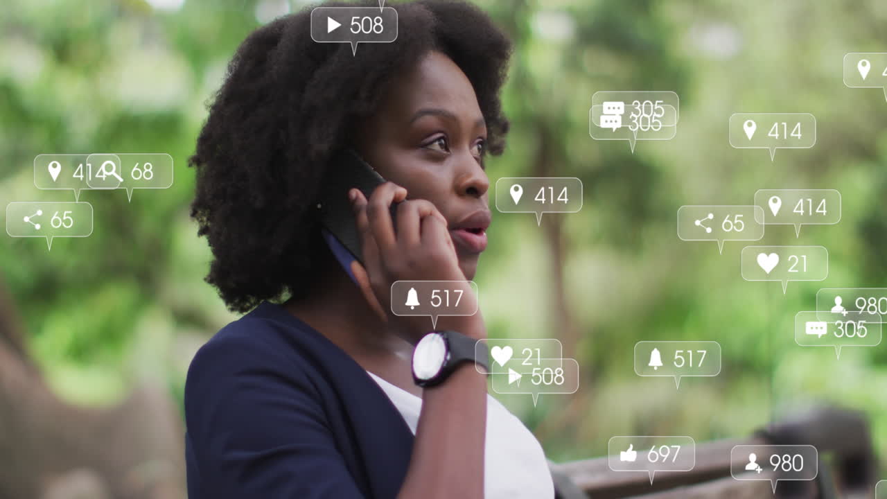 Animation of changing numbers in notification bars, african american woman talking on cellphone