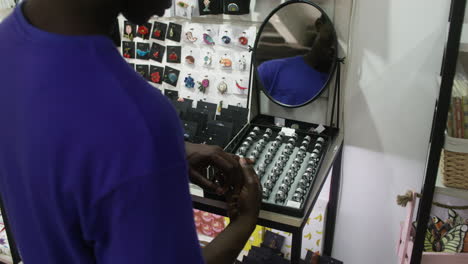 back view of young man in a store