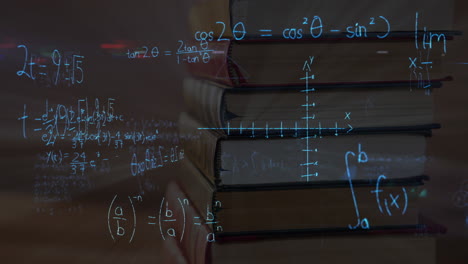 mathematical equations against stack of books