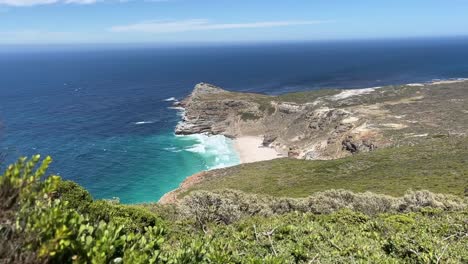 distant view of the cape of good hope in south africa, beautiful day with blue ocean