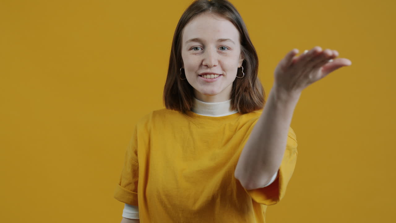 Young Woman Smiling and Gesturing