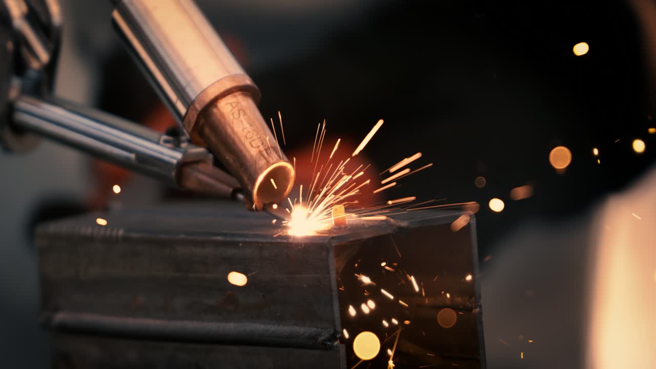 Laser welding machine. Shot on super slow motion camera 1000 fps. Laser welding is shown in close-up