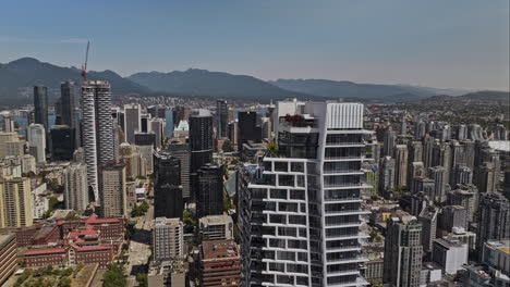 vancouver bc canada aerial v115 drone fly around one burrard place, capturing panoramic views of downtown cityscape, burnaby, false creek and english bay views - shot with mavic 3 pro cine - july 2023