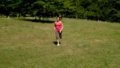 Fit-woman-sprinting-towards-camera