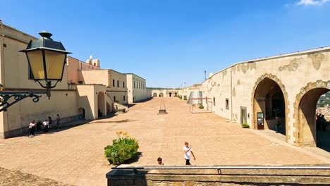 visitors enjoy a sunny day at the castle