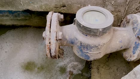 Waste-chemical-water-coming-out-from-the-dirty-water-meter-pipe