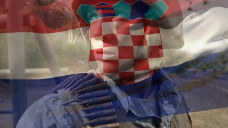 Animación-De-La-Bandera-De-Croacia-Sobre-Un-Soldado-Birracial-Con-Arma.